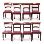 A SET OF EIGHT EARLY VICTORIAN MAHOGANY BAR BACKED DINING CHAIRS with red leatherette upholstery