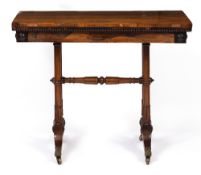 A WILLIAM IV ROSEWOOD RECTANGULAR TOPPED FOLD OVER CARD TABLE with green baize lined interior,