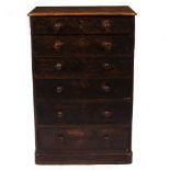 A VICTORIAN WALNUT CHEST OF SIX DRAWERS with turned knob handles and raised on a plinth base, 71cm