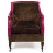 A LATE 20TH / EARLY 21ST CENTURY TUB SHAPED EASY ARMCHAIR with green and brown upholstery and having