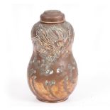 AN EARLY 20TH CENTURY JAPANESE COPPER TEA CADDY of double gourd form with impressed warrior