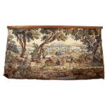 AN 18TH CENTURY STYLE MACHINE MADE TAPESTRY PANEL depicting a huntsman within a far reaching