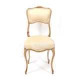 A FRENCH STYLE CREAM AND PARCEL GILT SIDE CHAIR for reupholstery, 40cm wide x 88cm high together