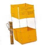 AN OLD BOX KITE in a tin tube for use in a life raft, the tin container approximately 55cm long with