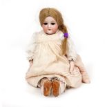 AN EARLY 20TH CENTURY ARMAND MARSEILLE BISQUE HEADED DOLL marked '370A.M.4/OX.DEP Made in Germany'