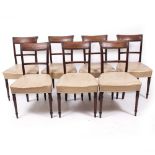 A SET OF SEVEN 19TH CENTURY MAHOGANY BAR BACK DINING CHAIRS with turned front legs and leather