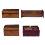 TWO HUMIDORS the largest 26cm wide together with an Edwardian mahogany and satinwood inlaid bookrack