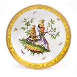 A MEISSEN PORCELAIN BOWL with yellow ground centrally decorated with exotic birds resting in