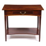 A MAHOGANY SIDE TABLE with reentrant bow front, single frieze drawer and square tapering legs united