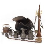 AN OLD IRON COAL SCUTTLE together with a group of pewter mugs, a coaching horn, a set of brass