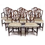 A SET OF EIGHT 19TH CENTURY MAHOGANY DINING CHAIRS with shield shaped backs, styalised splats,