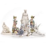 A PAIR OF CONTINENTAL PORCELAIN COURTLY FIGURES 32cm high together with a bisque porcelain figure of