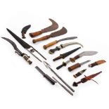 A COLLECTION OF EDGED WEAPONS AND TOOLS to include a Gurkhas kukri knife (15) Condition: in mixed