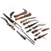 A COLLECTION OF EDGED WEAPONS AND TOOLS to include a Gurkhas kukri knife (15) Condition: in mixed