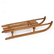 A VINTAGE ASH AND BEECH SLEDGE with iron runners, 97cm long x 33cm wide Condition: some dirt, loss