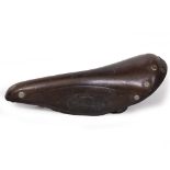 A VINTAGE BROOKS LEATHER RACING SADDLE 'Champion B17 Sprinter', 28.5cm long Condition: the leather