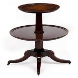 A MODERN MAHOGANY TWO TIER DUMB WAITER 66cm diameter x 67cm high Condition: one brass foot
