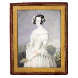 AN EARLY TO MID 19TH CENTURY MINIATURE PORTRAIT depicting a bride with flowers in her hair and