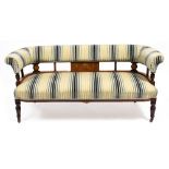 A VICTORIAN ROSEWOOD SMALL TWO SEATER SOFA with decorative inlay, scrolling upholstered back and