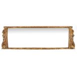 A 19TH CENTURY GILDED WOOD FRAMED TRIPLE PLATE MIRROR with bevelled glass, 146cm wide x 45cm high At