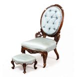 A VICTORIAN WALNUT FRAMED UPHOLSTERED LOW CHAIR 56cm wide x 54cm deep x 97cm high with a similar