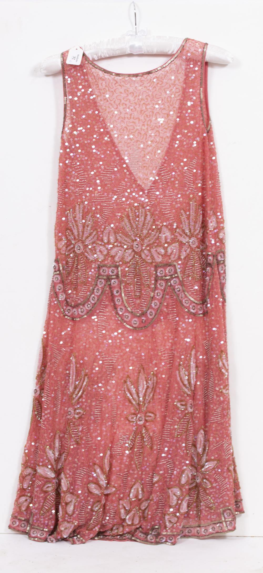 A PINK SEQUINED FLAPPER TYPE DRESS with floral motifs 113cm in length together with a further art - Image 7 of 7