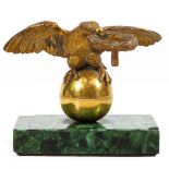 A 19TH CENTURY RUSSIAN ORMOLU AND MALACHITE DESK STAND of eagle and ball form with an ormolu