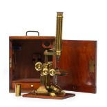 A LATE VICTORIAN 13 INCH UNSIGNED MICROSCOPE with coarse and fine focusing, mechanical stage and