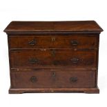 A WALNUT CHEST OF THREE LONG DRAWERS 111cm wide x 57.5cm deep x 78cm high Condition: marks, dents