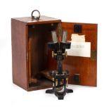 AN EARLY 20TH CENTURY BINOCULAR MICROSCOPE by C.Baker numbered 6452 in a fitted mahogany case