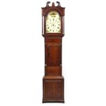 AN EARLY 19TH CENTURY OAK EIGHT DAY LONGCASE CLOCK with swan neck pediment and fluted pilaster