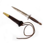 A COMMANDO DAGGER and scabbard, the dagger 29.7cm in length Condition: the blade surface worn, minor