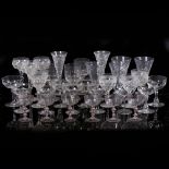 A COLLECTION OF FOUR LARGE WINE GLASSES with fluted conical bowls, 9.2cm diameter x 16.8cm high