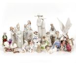 A COLLECTION OF PORCELAIN FIGURINES to include Lladro and Beatrix Potter Condition: the Lladro