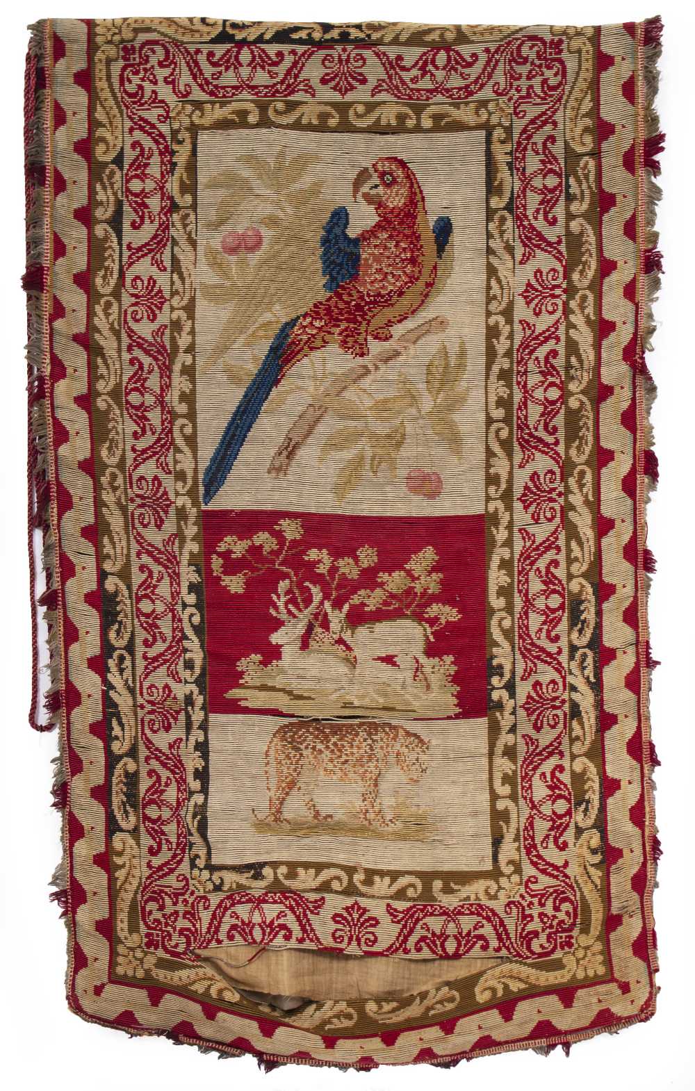 A VICTORIAN NEEDLEWORK BANNER depicting a parrot on a fruiting branch and with deer and a leopard