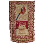 A VICTORIAN NEEDLEWORK BANNER depicting a parrot on a fruiting branch and with deer and a leopard