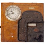 AN EARLY 20TH CENTURY FRENCH OAK CASED CLOCKING IN MACHINE marked Leon Bajol Paris, the clock with