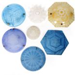 FOUR PRESSED BLUE GLASS PLAFONNIERS, three circular all approximately 35cm diameter and one