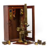 A LARGE LATE 19TH CENTURY UNSIGNED MICROSCOPE on a Ross pattern stand, with coarse and fine