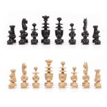 A TURNED WOODEN CHESS SET the kings 8.5cm high Condition: the four knights possibly reglued, one