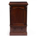 A EDWARDIAN MAHOGANY SAFE CABINET with single panel door over a drawer and on a plinth base (no safe