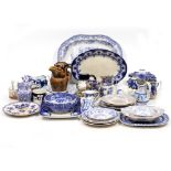 A COLLECTION OF ANTIQUE BLUE AND WHITE CHINA to include a meat platter, various plates, jugs and