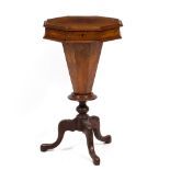 A VICTORIAN OCTAGONAL WORKTABLE with lifting lid and fitted interior, tapering support and tripod