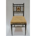 Aesthetic movement chair ebonised with carved panel 83cm high