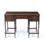 In the Manner of Edward William Godwin (1833-1886) desk, stamped 'Collinson & Lock, London, 5384' to