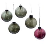 In the manner of Carl Fagerlund for Orrefors five spherical pendant lights with textured shades in