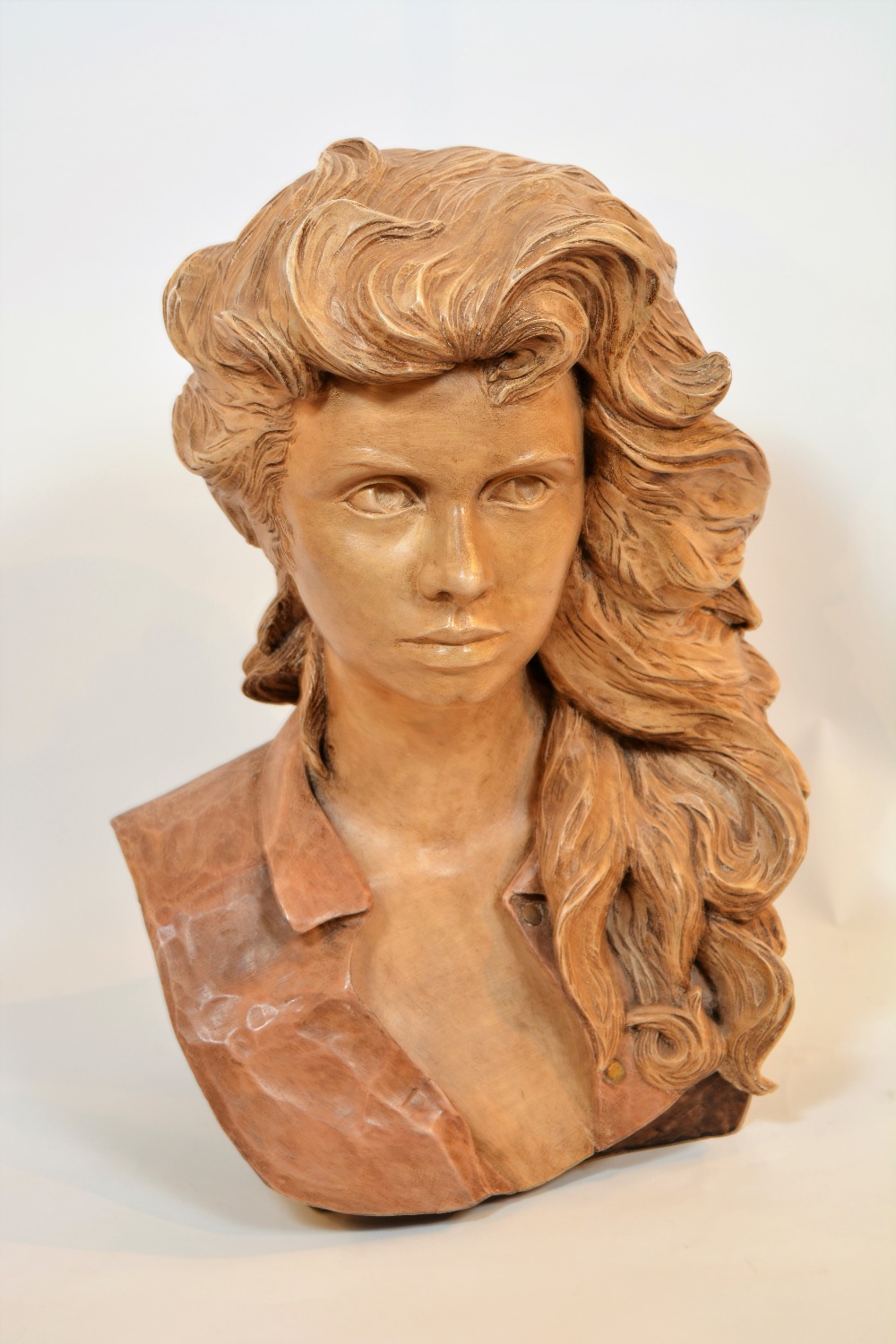 Julian Stanley (b.1951) 'Female Bust', 1994, painted carved limewood signed with initials 49cm high