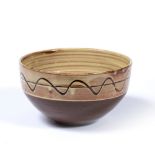 Winchcombe Pottery bowl with combed slip glaze seal mark to base 20cm across