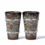 Mary Butter for Royal Doulton pair of Lambeth stoneware beakers, with silver rims, circa 1878 with
