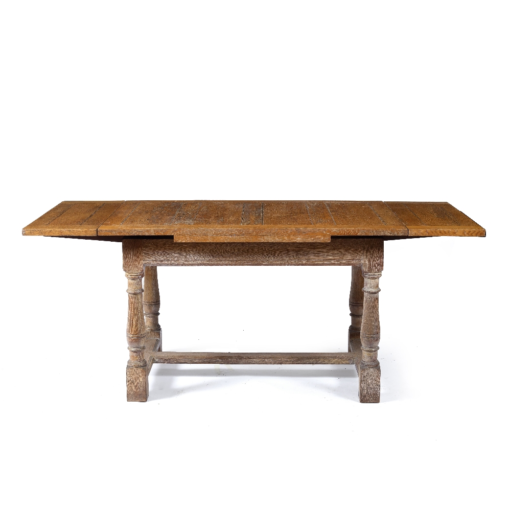 Heals extending dining table, circa 1915, limed oak with label/plaque 122cm wide x 72cm high x